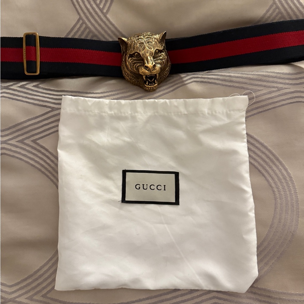 Gucci Women’s Red and Black Belt with Gold Lion Buckle